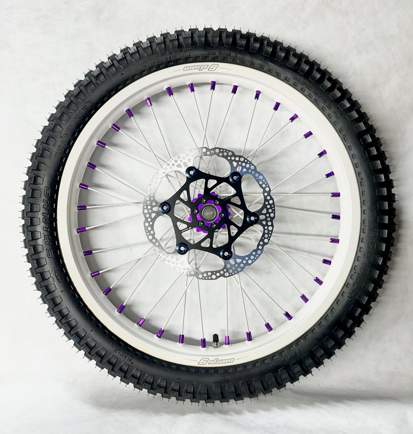 Warp 9 E Ride Pro Front 19 x 1.60 White Rim & Spokes, Purple Hub & Nipples W/ Titanium and Tire Complete
