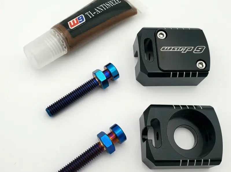 Warp 9 Surron Rear Lockout Axle Blocks, Steel Cap, Black blocks & Titanium Adjustment Bolts Warp 9 Racing