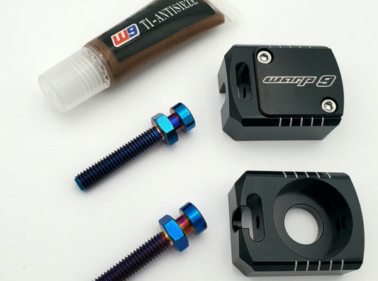 Warp 9 Surron Rear Lockout Axle Blocks, Steel Cap, Black blocks & Titanium Adjustment Bolts