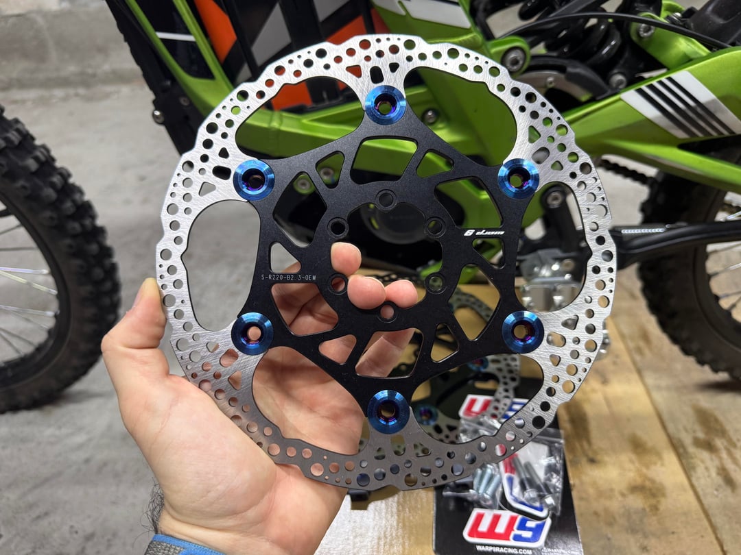 Warp 9 Rear Surron / Segway 220mm x 2.3mm w/ Blue Buttons Floating Rotor. Fits Warp 9 Front and Rear Hubs and OEM Front Only @105 2-10c