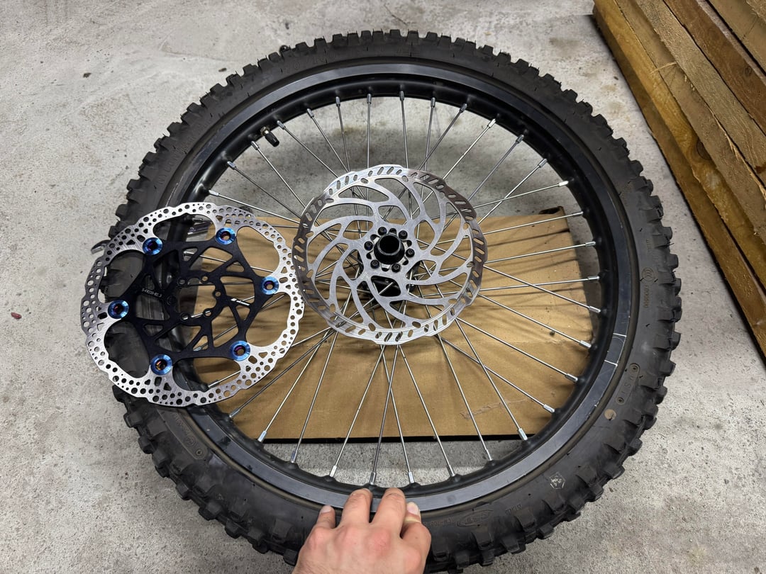 Warp 9 Rear Surron / Segway 220mm x 2.3mm w/ Blue Buttons Floating Rotor. Fits Warp 9 Front and Rear Hubs and OEM Front Only @105 2-10c